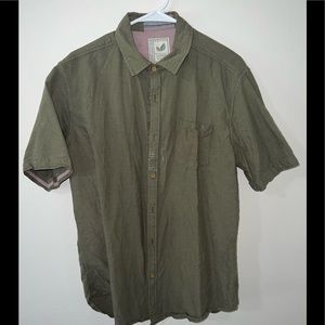 Green button down, lightly worn.